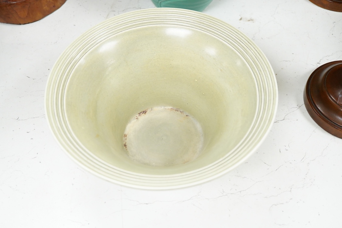 A Susie Cooper incised jug, 22cm high and similar bowl, each incised with animals (2)